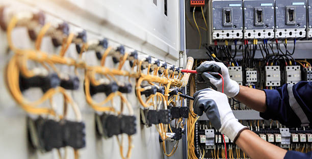 Professional Electrician technician working in Plano, TX